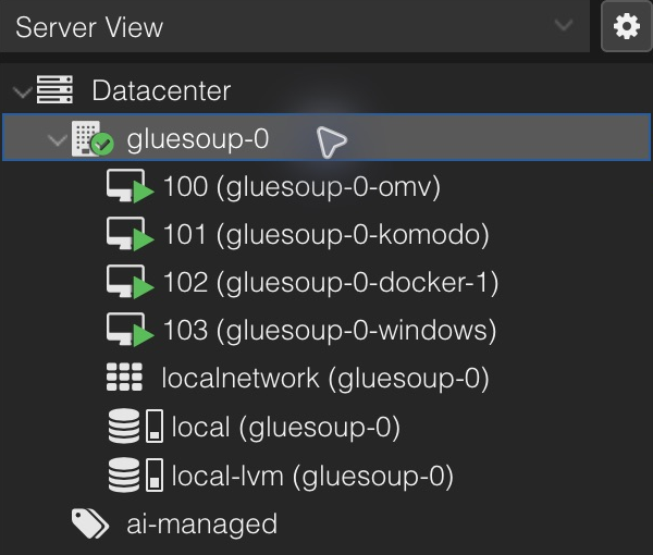 The Proxmox resource tree lists four running guests on gluesoup-0: OpenMediaVault, Komodo, Docker and Windows.